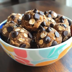 - 1 cup rolled oats - 1/2 cup natural peanut butter - 1/4 cup honey or maple syrup - 1/2 cup chocolate chips - 1/4 cup ground flaxseed - 1/4 teaspoon sea salt - 1/2 teaspoon vanilla extract - Optional additions - Mini marshmallows - Dried fruits (raisins, cranberries, apricots) What are the health benefits of these ingredients? Each ingredient brings something good. - Rolled oats provide fiber and keep you full. - Peanut butter gives protein and healthy fats. - Honey or maple syrup adds natural sweetness. - Chocolate chips offer a tasty treat. - Ground flaxseed is packed with omega-3 fatty acids. - Sea salt balances flavors and helps hydration. - Vanilla extract adds a warm flavor. Each serving has about 100 calories. This makes them a great snack for energy without too many calories. These bites offer a balance of nutrients. They are great for a quick energy boost before or after a workout. You can find the full recipe in the earlier sections to make these delicious bites! To start, grab a large mixing bowl. First, mix the dry ingredients. Add 1 cup rolled oats, 1/4 cup ground flaxseed, and 1/4 teaspoon sea salt. Use a spatula to stir until they are well combined. Next, it's time to combine the wet ingredients. Add 1/2 cup natural peanut butter, 1/4 cup honey or maple syrup, and 1/2 teaspoon vanilla extract to the bowl. Stir vigorously until everything melds into a slightly sticky dough. Now, let’s shape the energy bites. With clean hands, take small amounts of the mixture. Aim for balls about 1 inch in diameter. If the dough is too sticky, dampen your hands lightly. You can also chill the mixture for 15-30 minutes to make it easier to handle. For easier shaping, arrange the energy bites on a parchment-lined baking sheet or a plate. This keeps them from sticking together. Chilling is crucial. Place the tray in the refrigerator and let the bites chill for at least 30 minutes. This helps them firm up and hold their shape. For storing, keep any leftovers in an airtight container in the fridge. They will last up to a week. If you want to keep them longer, freeze them. This way, you’ll have energy snacks ready whenever you need a boost! To make sure your energy bites mix well, start with dry ingredients. In a big bowl, stir rolled oats, flaxseed, and salt. Use a spatula or spoon for even mixing. Next, add peanut butter, honey, and vanilla. Stir until you see a sticky dough. If it feels too sticky, chill it for a bit. This makes it easier to handle. Dampen your hands lightly if needed to avoid a mess. You can boost the flavor by using different types of chocolate. Dark chocolate adds richness, while semi-sweet gives a classic taste. Want to spice things up? Add cinnamon or a dash of almond extract. These small changes can make your bites even more delicious! For a fun presentation, place your energy bites in a bright bowl. Add a sprinkle of chocolate chips on top for flair. Pair these bites with a glass of cold milk or a warm cup of tea. They also go well with fresh fruit or yogurt. Enjoy these snacks any time of day! {{image_4}} You can easily adjust this recipe to fit your diet. If you want a vegan option, simply swap honey for maple syrup. This keeps the bites sweet and plant-based. For those avoiding gluten, use gluten-free oats. They work just as well to hold everything together. Feel free to get creative with flavors. Adding nuts or seeds can give your energy bites a nice crunch. Try almonds, walnuts, or sunflower seeds for added texture. You can also incorporate protein powder if you want an extra boost. Just mix it in with the dry ingredients. Change up the flavors with the seasons. In the fall, consider adding pumpkin spice for a warm, cozy taste. For summer, think about infusing the bites with dried fruits like apricots or peaches. This keeps things fun and fresh, no matter the time of year. To keep your peanut butter chocolate chip energy bites fresh, store them in the refrigerator. Use an airtight container to maintain their taste and texture. This way, they stay moist and ready to eat. Choose a glass or plastic container with a tight lid. This will help keep any odors from other foods away. You can freeze these energy bites for longer storage. To freeze, place them in a single layer on a baking sheet. Once frozen, transfer them to a freezer-safe bag or container. This helps prevent them from sticking together. When you're ready to eat, just take out a few and let them thaw at room temperature. You can also microwave them for a few seconds for a warm treat. When stored properly, these energy bites last about one week in the fridge. If you freeze them, they can last up to three months. Look out for signs of spoilage. If they smell off or have a strange texture, it's best to toss them. Always trust your senses when it comes to food safety. To make these energy bites, follow these easy steps: 1. Gather a large bowl and mix rolled oats, ground flaxseed, and sea salt. 2. Add peanut butter, honey or maple syrup, and vanilla extract. Stir well. 3. Fold in chocolate chips and any optional ingredients like mini marshmallows or dried fruits. 4. Use your hands to form small balls, about 1 inch in size. If sticky, dampen your hands or chill the mix. 5. Place the bites on a parchment-lined sheet and chill for at least 30 minutes. 6. Store leftovers in an airtight container in the fridge for up to a week. You can freeze them too! Yes, you can substitute peanut butter with almond or sunflower seed butter. For sweeteners, honey can be replaced with agave nectar or maple syrup. Choose what suits your taste! These energy bites last up to a week in the fridge. For longer storage, freeze them in an airtight container. They can stay fresh for about three months in the freezer. Yes, they are packed with nutrients! Rolled oats provide fiber, while peanut butter adds protein and healthy fats. Ground flaxseed is rich in omega-3 fatty acids. Enjoy a boost of energy with these tasty bites! Absolutely! You can mix in protein powder while combining the wet and dry ingredients. Start with one scoop and adjust based on your needs. This adds extra protein and keeps you fuller for longer. For the complete recipe, check out the [Full Recipe]. Enjoy your cooking adventure! In this blog, we covered how to make delicious Peanut Butter Chocolate Chip Energy Bites. You learned about the key ingredients, like rolled oats and peanut butter, and their health benefits. I shared step-by-step instructions, helpful tips, and fun variations. These bites are not just tasty but also easy to customize. Remember, you can store them in the fridge or freezer for later use. Enjoy your tasty snacks that energize your day!