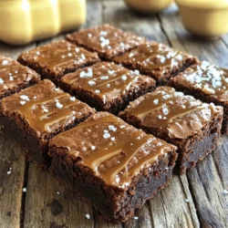 To make these salted caramel brownies, gather the following items: - 1 cup (2 sticks) unsalted butter - 1 cup dark chocolate chips - 1 cup granulated sugar - 1/2 cup packed brown sugar - 4 large eggs - 1 teaspoon pure vanilla extract - 1 cup all-purpose flour - 1/2 cup unsweetened cocoa powder - 1 teaspoon baking powder - 1/2 teaspoon fine sea salt - 1/2 cup salted caramel sauce (store-bought or homemade) - Flaky sea salt, for garnish You will find that each ingredient plays a key role. The butter and chocolate create a rich base. The sugars add sweetness and moisture. Eggs lend structure, while flour and cocoa provide texture. If you need alternatives, consider these substitutions: - Use coconut oil instead of unsalted butter for a dairy-free option. - Replace dark chocolate chips with semi-sweet or milk chocolate chips if you prefer a sweeter taste. - For a gluten-free option, swap all-purpose flour for a gluten-free blend. - Maple syrup can replace granulated sugar for a natural sweetener. Be mindful of how each swap may change the flavor and texture. Quality matters! Use high-quality chocolate chips for the best flavor. Look for pure vanilla extract, not imitation. Fresh eggs and good butter improve the taste. If you can, make your own salted caramel sauce for a special touch. These small choices make a big difference in your final result. Enjoy creating these delicious salted caramel brownies with top-notch ingredients! You can find the full recipe at the beginning of the article. Start by gathering your ingredients. This includes: - 1 cup (2 sticks) unsalted butter - 1 cup dark chocolate chips - 1 cup granulated sugar - 1/2 cup packed brown sugar - 4 large eggs - 1 teaspoon pure vanilla extract - 1 cup all-purpose flour - 1/2 cup unsweetened cocoa powder - 1 teaspoon baking powder - 1/2 teaspoon fine sea salt - 1/2 cup salted caramel sauce - Flaky sea salt, for garnish Make sure to measure everything before you begin. This helps keep the flow smooth. Preheat your oven to 350°F (175°C). Grease a 9x13-inch baking pan or line it with parchment paper. This step makes removal easy later. In a medium saucepan, melt the butter and dark chocolate chips over low heat. Stir until smooth. Remove it from heat and let it cool for a moment. In a large bowl, whisk together the granulated sugar, brown sugar, and eggs. Mix until it looks frothy. Add the vanilla extract and stir again. Now, pour the cooled chocolate mixture into this bowl. Stir until it's fully mixed. In a separate bowl, sift the flour, cocoa powder, baking powder, and fine sea salt together. Carefully fold this dry mix into the chocolate mix. Be gentle to keep the texture nice. Pour half of the brownie batter into the prepared pan. Spread it evenly. Drizzle the salted caramel sauce on top. If you like, swirl it with a toothpick for a marbled look. Pour the rest of the brownie batter over the caramel. Smooth it out to cover everything. Bake in the oven for 25-30 minutes. To check for doneness, insert a toothpick in the center. It should have a few moist crumbs, not wet batter. Once done, take the brownies out and let them cool in the pan for about 10 minutes. While they are warm, sprinkle flaky sea salt on top for that perfect sweet and salty taste. Let the brownies cool completely in the pan. Once cool, cut them into squares. You can serve them plain or drizzle more salted caramel on top for extra flavor. Pair them with a scoop of creamy vanilla ice cream for a treat everyone will love. For the full recipe, refer to the earlier section. Enjoy your delicious creation! To get the best salted caramel flavor, use high-quality caramel sauce. You can choose store-bought or make your own. When making caramel, heat sugar slowly until it melts and turns golden. Add butter and cream for richness. Then, mix in a pinch of flaky sea salt. This balance adds depth to your brownies. One common mistake is overcooking the brownies. Keep a close eye on them. Remove them from the oven once a toothpick comes out with a few moist crumbs. Another mistake is using cold ingredients. Always bring eggs and butter to room temperature for a smooth batter. Lastly, don’t skip the flaky sea salt on top. It enhances the sweet and salty mix. To make your brownies extra moist, use a mix of granulated and brown sugar. Brown sugar adds moisture, while granulated sugar gives structure. Also, do not overmix your batter. Mixing too much can lead to a dense texture. For an even fudgier brownie, consider adding an extra egg yolk. This tip helps keep the brownies soft and rich. For more tips and to try the recipe, check out the Full Recipe. {{image_4}} You can easily make vegan salted caramel brownies. Replace the butter with coconut oil. Use flax eggs instead of real eggs. For each egg, mix one tablespoon of ground flaxseed with three tablespoons of water. Let it sit until it thickens. Choose dairy-free chocolate chips for rich flavor. You can use a homemade vegan caramel sauce or store-bought options. These changes keep the taste while making the brownies plant-based. For a gluten-free version, swap all-purpose flour with almond flour or a gluten-free blend. Make sure the chocolate chips are gluten-free as well. This option keeps the brownies rich and fudgy, with no compromise on flavor. Remember to check for cross-contamination if you are sensitive to gluten. You can add nuts or spices to elevate your brownies. Walnuts or pecans add a nice crunch. Chop them and mix them in before baking. If you like spice, consider adding a pinch of cinnamon or espresso powder. A touch of chili powder can give a surprising kick. These small tweaks can change the flavor and make your brownies unique. For more delicious ideas, check out the Full Recipe. To keep leftover brownies fresh, let them cool completely. Place them in an airtight container. You can store them at room temperature for up to three days. If you want them to last longer, keep them in the fridge. They can stay fresh for about a week in the fridge. Just remember to let them warm up a bit before eating for the best taste. If you want to save some brownies for later, freezing is a great option. Cut the brownies into squares. Wrap each piece in plastic wrap tightly. Then, place them in a freezer-safe bag or container. They can stay in the freezer for up to three months. When you're ready to enjoy, just take out what you need and let them thaw at room temperature. To bring back the warm, gooey goodness, reheat the brownies. You can use the microwave for quick warming. Just heat for about 10-15 seconds. If you want a crispier edge, use an oven. Preheat it to 350°F (175°C) and warm the brownies for about 5-10 minutes. Add a drizzle of salted caramel sauce on top before serving for an extra special treat. For the full recipe, check out the complete guide on making these brownies. Yes, you can use homemade salted caramel sauce. It adds a personal touch and rich flavor. To make your own, melt sugar in a pot until it turns amber. Then, add butter and cream cautiously. Stir until smooth, then mix in sea salt. This method allows you to control the sweetness and saltiness. Homemade sauce often tastes fresher than store-bought. Salted caramel brownies last about 3 to 4 days at room temperature. Store them in an airtight container to keep them moist. If you want to keep them longer, refrigerate them, and they can last up to a week. Just remember that the texture may change slightly when chilled. For the best taste, enjoy them fresh! To cut brownies cleanly, let them cool completely first. Use a sharp knife for smooth cuts. Warm the knife slightly under hot water, then wipe it dry. This technique helps prevent sticking. For even squares, cut the brownies into rows, then into columns. Cleaning the knife between cuts gives you perfect edges every time. Enjoy your beautiful salted caramel brownies! You now have all the tools to make delicious salted caramel brownies. We covered the key ingredients, useful tips, and even variations for different diets. Remember to prep well and avoid common mistakes. Your brownies will shine with a rich flavor and perfect texture. Store them correctly to enjoy later or share with friends. Bake with confidence, and have fun experimenting with flavors. Satisfying your sweet tooth has never been easier!